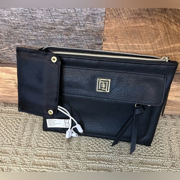 Liz Claiborne Handbags - Liz Claiborne Black Charging Wrislet Clutch w/ built in power bank